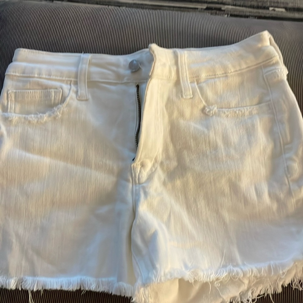 VERVET white cutoff shorts, size Junior Medium.